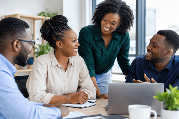 Employees collaborating in a positive workplace environment